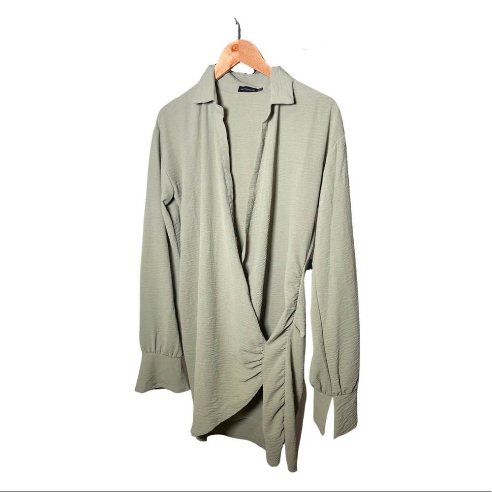 Dressy olive green mini dress.  Loose on the top tight on the bottom